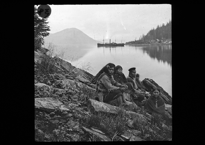 'Natives in Alaska 1868. Paddlesteamer in background. Helios, copyright Kingston Museum and Heritage Service, 2010'